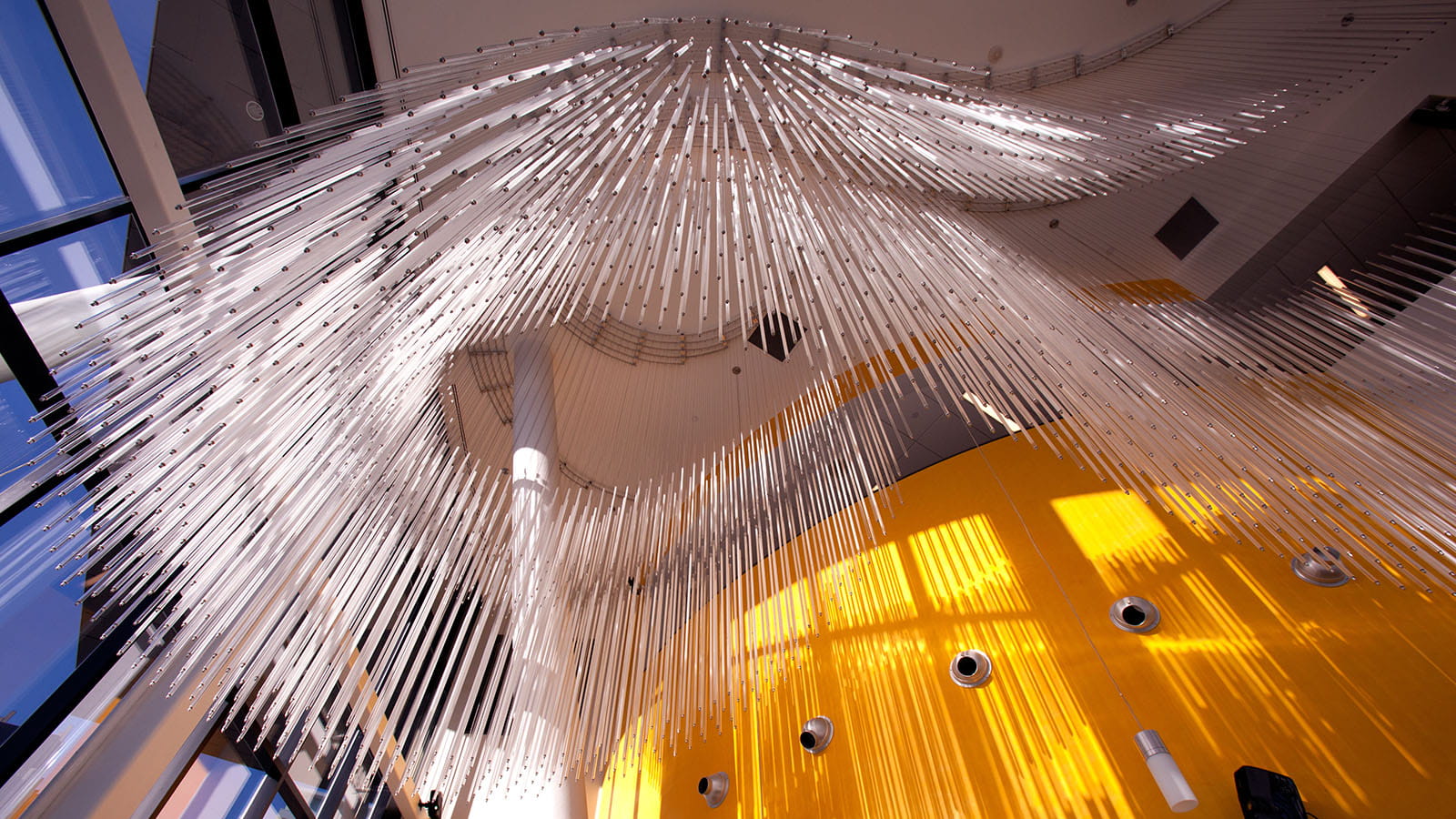 Glass installation hanging from the ceiling of the Atrium in Hazel McCallion Campus' A-Wing